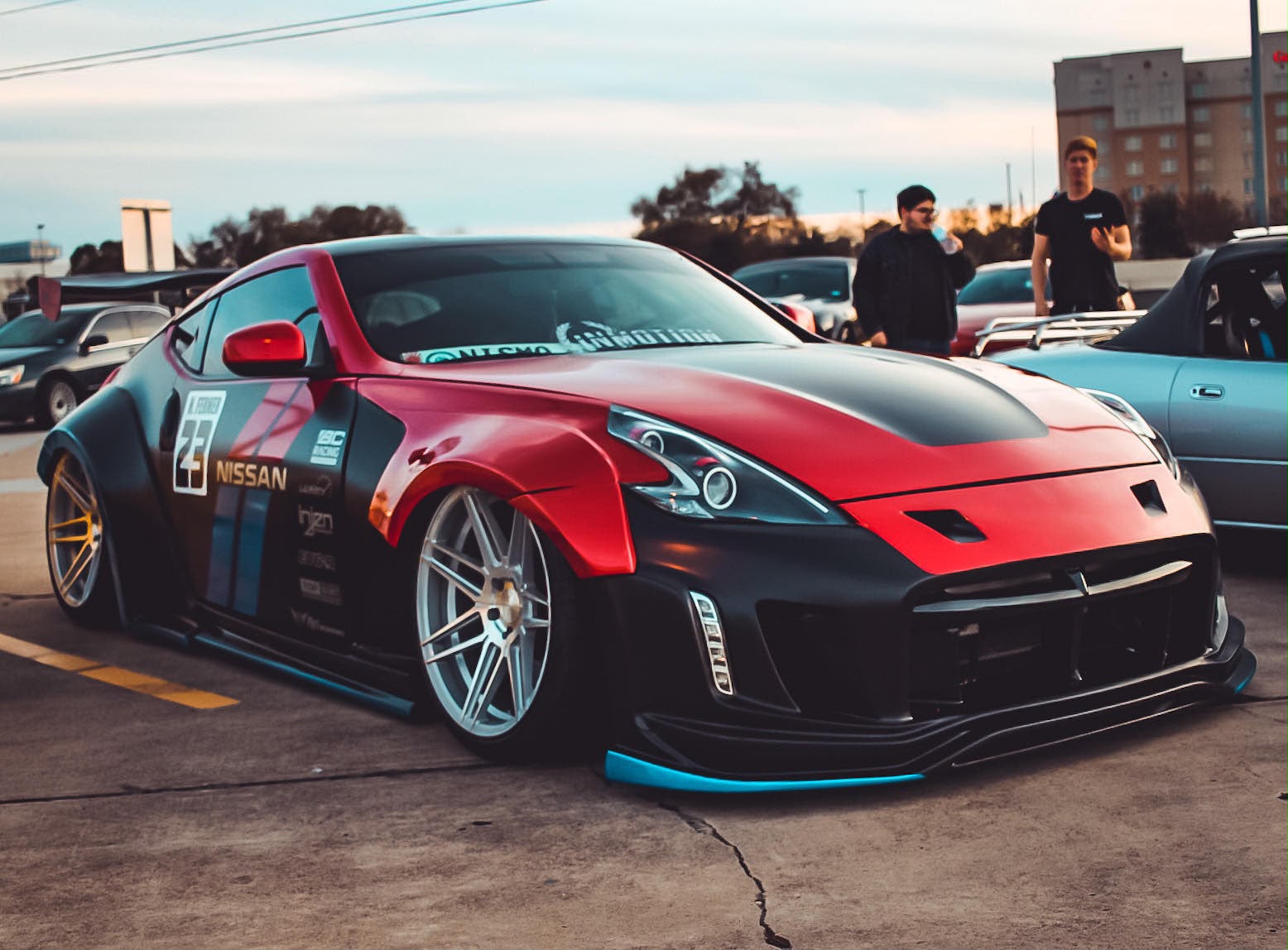 Red and black Nissan 370Z at a Lowlife evening car meet
